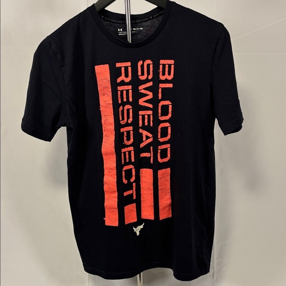 Under Armour Black Tee with Bold Orange Text Men’s Size Small - Picture 2 of 6